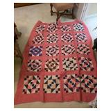 Hand-Stitched Patchwork Quilt with Geometric Patte