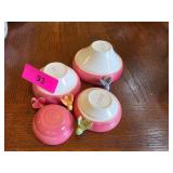 Four Menschik Goldman Measuring Cups
