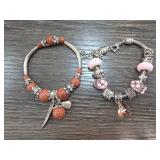 Two Charm Bracelets with Beaded Designs