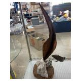Abstract Metal Sculpture on Stone Base