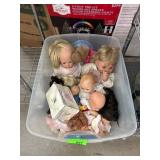 Plastic Bin Full of Assorted Dolls