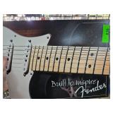 Fender ï¿½Built to Inspireï¿½ Metal Sign