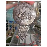 Metal Hand Mirror with Ornate Handle Design