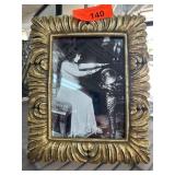 Gold-Toned Ornate Picture Frame with Black Back