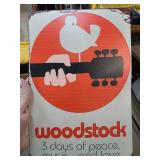 Woodstock Tin Sign With Red Circle Design