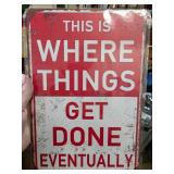 Red and White Decorative Metal Sign