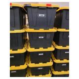 Stack of Black and Yellow Storage Totes