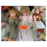 Porcelain Dolls in Various Outfits