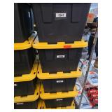Five Black and Yellow Storage Bins
