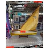 Handcrafted Wooden Model Sailboat with Yellow Sail