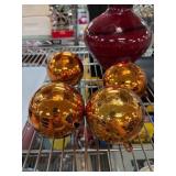 Four Reflective Gold-Tone Glass Ornaments
