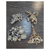Four Decorative Brooches