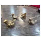 Four Metal Bird Figurines