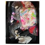 New Clothing Items in Packaging