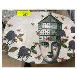 Decorative Ceramic Plate with Surreal Design