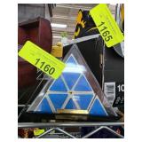 Triangular Puzzle with Rotating Panels