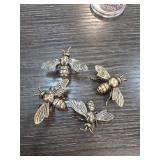 Four Metal Bee Figurines