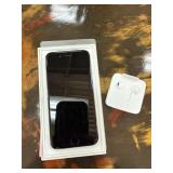 Apple iPhone with Accessories in Box