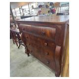 Four-Drawer Wooden Dresser with Curved Side Panels