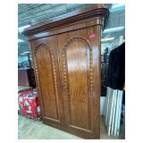 Wooden Armoire With Shelves and Drawers