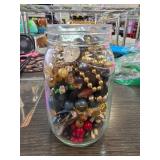 Glass Jar Filled with Assorted Jewelry