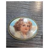 Vintage Angel Motif Brooch with Brass Tone Frame