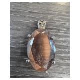 Oval Brown Gemstone Pendant with Metal Setting