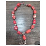 Red Beaded Necklace with Pendant and Metal Accents