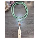 Green Beaded Necklace With Feather Pendant