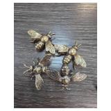 Four Metallic Bee Sculptures
