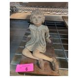Handcrafted Child Figurine on Wooden Base