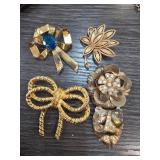 Five Gold-Tone Decorative Brooches