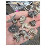 Metal Figural Pins and Brooches