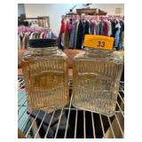 Two Clear Glass Tea Canisters