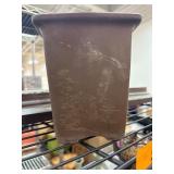 Brown Ceramic Pot with Engravings and Markings
