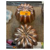 Copper-Toned Decorative Molds