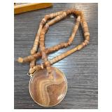 Beaded Necklace With Engraved Stone Pendant