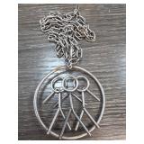 Metal Pendant With Abstract Stick Figures