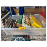 Plastic Bin of DIY and Home Improvement Books