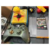 Gaming Lot With Joystick, Controller, and NES Game
