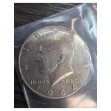 1964 Kennedy Half Dollar Coin in Protective Sleeve