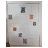 Worldwide Stamps on Album Pages
