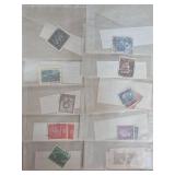 International Postage Stamps in Sleeves