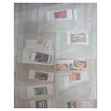 Postage Stamps in Envelopes