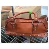 Bisou Bisou Leather Handbag with Gold-Tone Accents