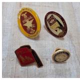 Four Commemorative Lapel Pinsï¿½