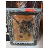 Framed Artwork Depicting a Goat's Head