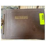 Vintage Photograph Album with Portraits and Scenes