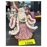 Painted Santa Figurine Holding Gifts