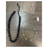 Two Beaded Necklaces with Green and Black Beads